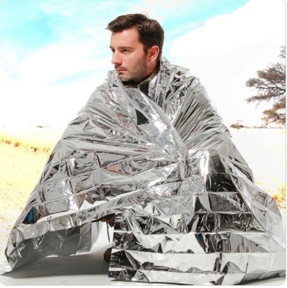 Human Body Hypothermia Lifesaving Emergency Blanket In Outdoor Field - Image 6