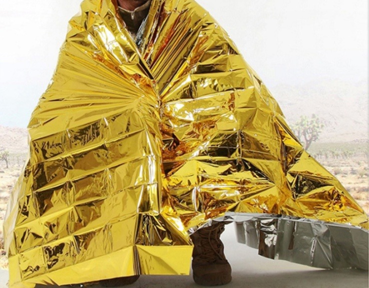 Human Body Hypothermia Lifesaving Emergency Blanket In Outdoor Field - Image 7