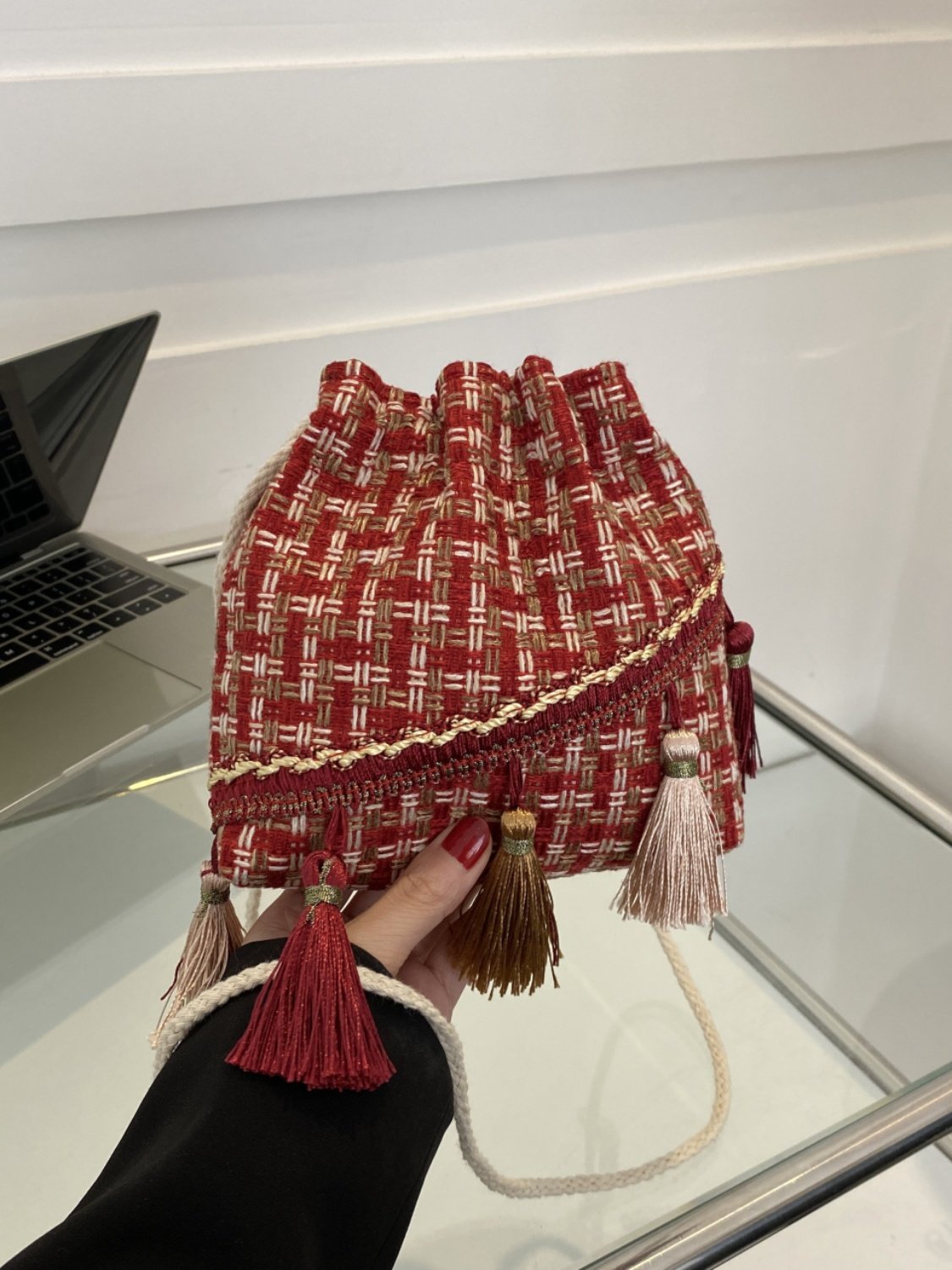 Yeppi Tassel Trim Woven Bucket Crossbody Bag